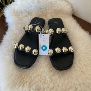 NWT black sandals with silver embellishments